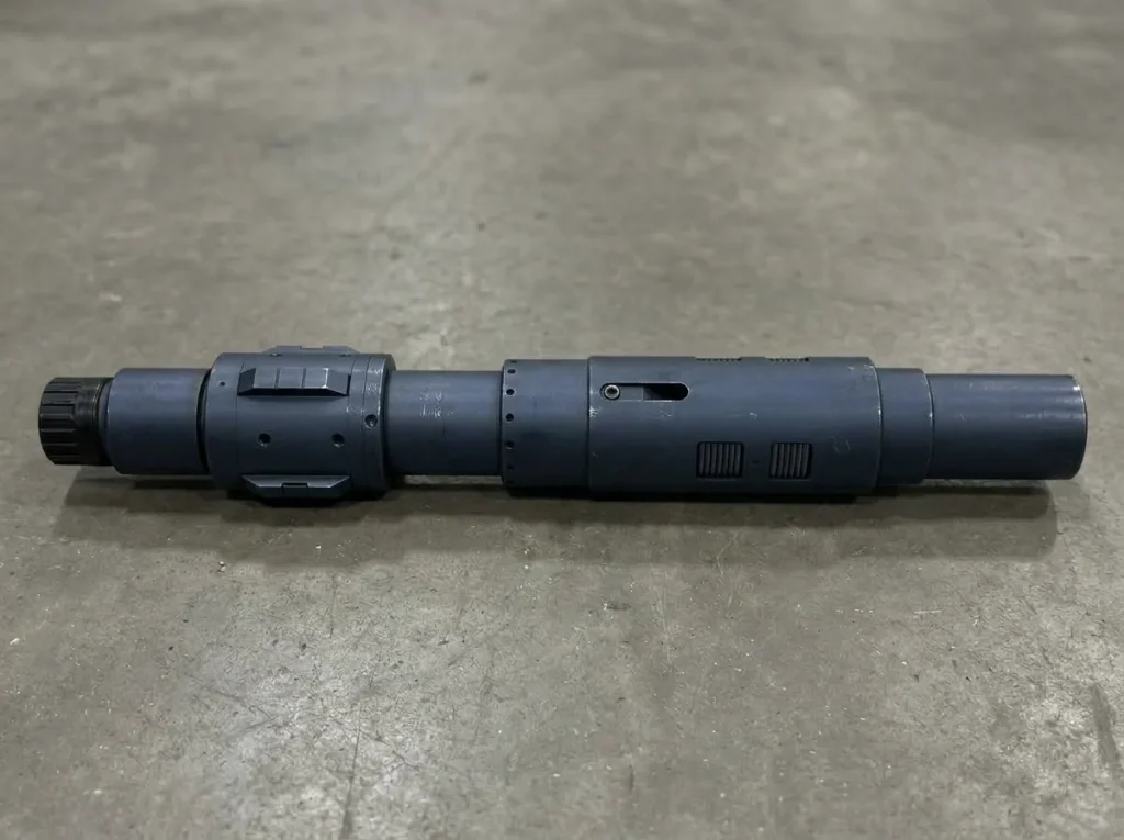C-1 tubing anchor catcher lying on a shop floor